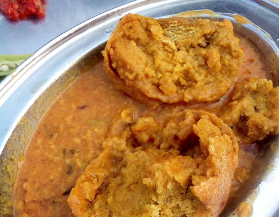 Dal Baati — baked wheat rolls served with spiced lentil dal